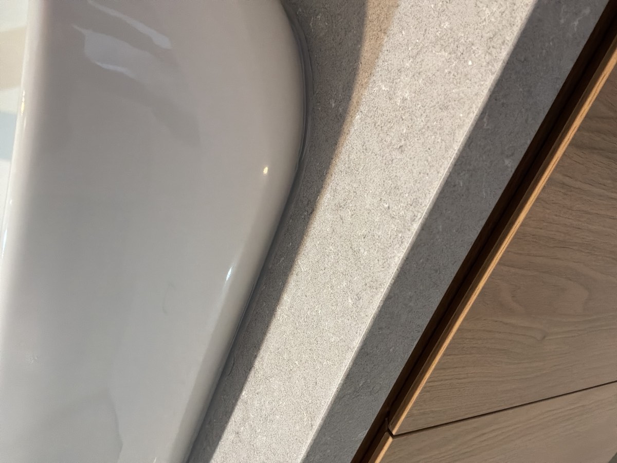 Rough sealant, recorded during a handover inspection in Riverstone